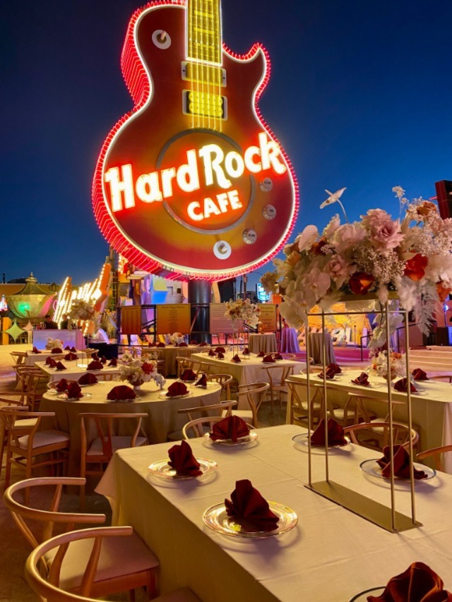 Event set up under Hard Rock Cafe neon sign at the Neon Museum LV