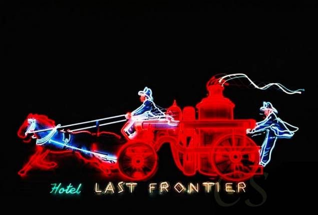 Last Frontier neon sign at night by Clyde Sanborn
